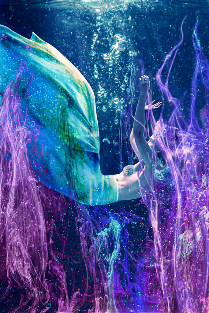 A figure immersed in water, highlighted by swirling blue and purple hues.
